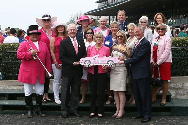 Paul Miller Ford presenting Horses and Hope Pink Mustang replica to KY Cancer Program.